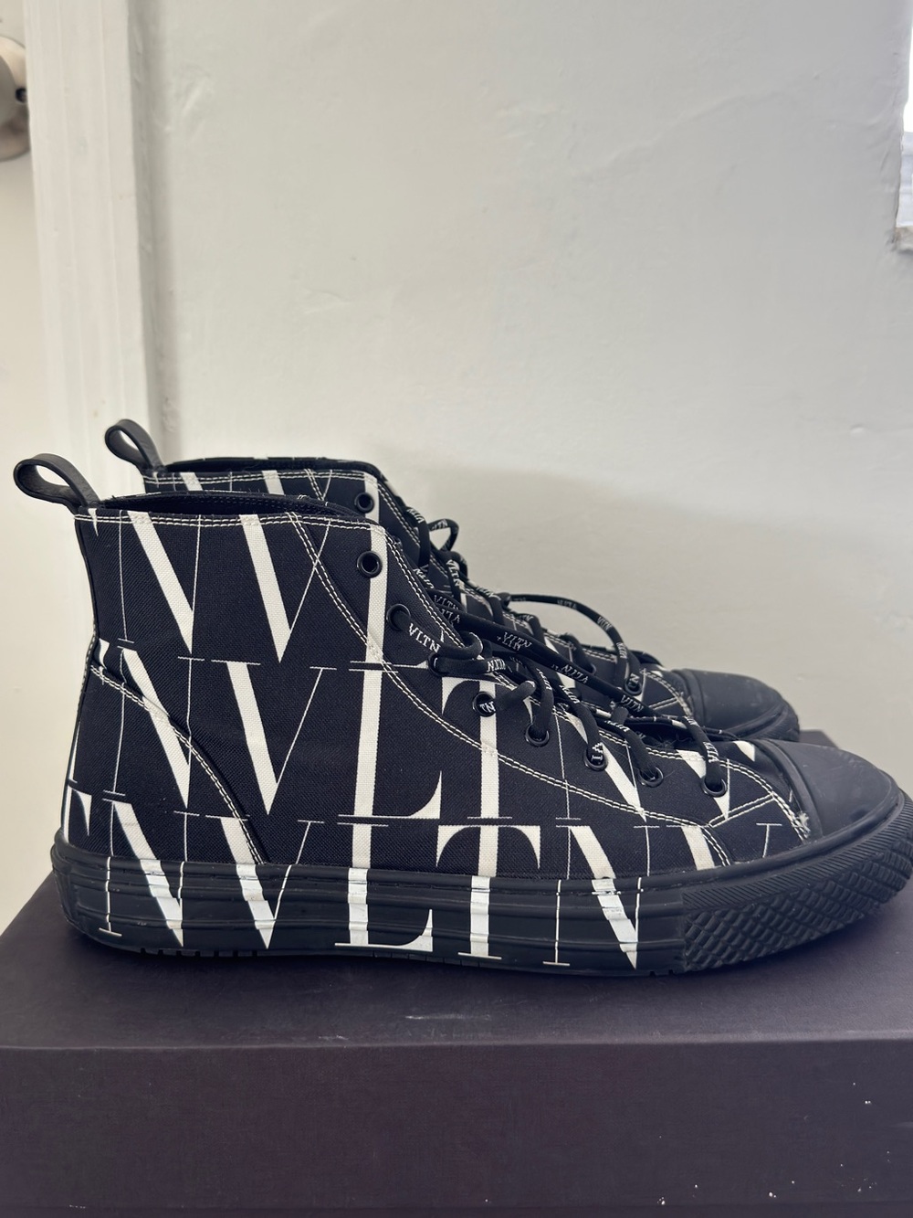 Valentino Black and White Logo High-Top Sneakers